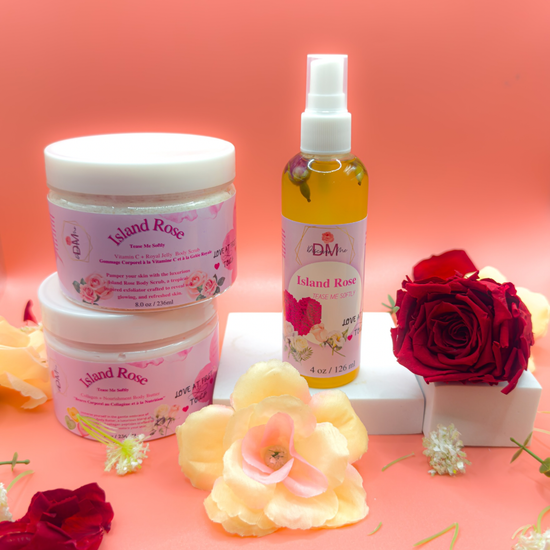 "Island Rose Body Butter, Body Polish and Body Oils from Discover Me Shop, beautifully presented with soft pink and cream floral accents on a romantic coral background.